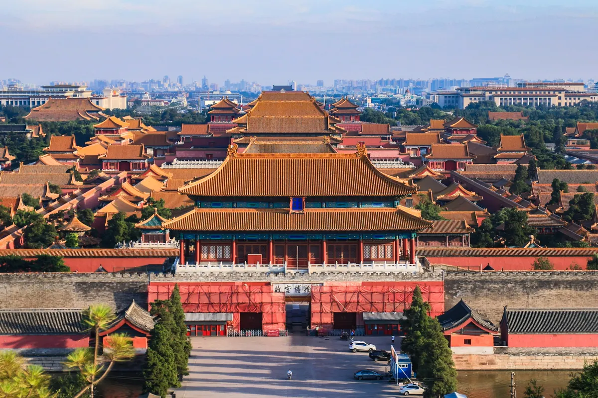 The yellow roofs of the Forbidden City seen from Jingshan, with the north gate and moat in the foreground